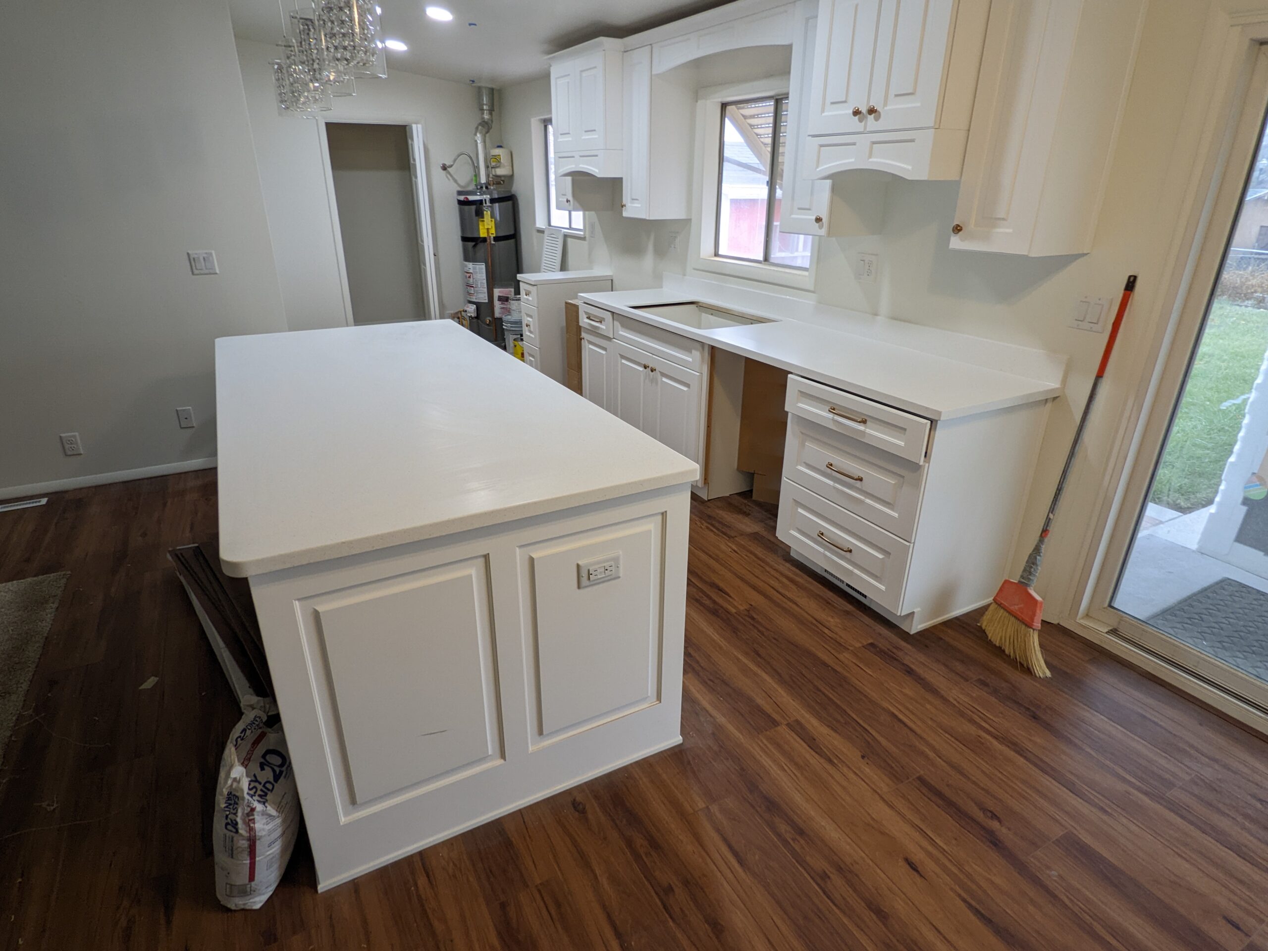 Kitchen home improvements. HTS Builders, Remodeling & Basement Finishing is adding an island for more functional space.
